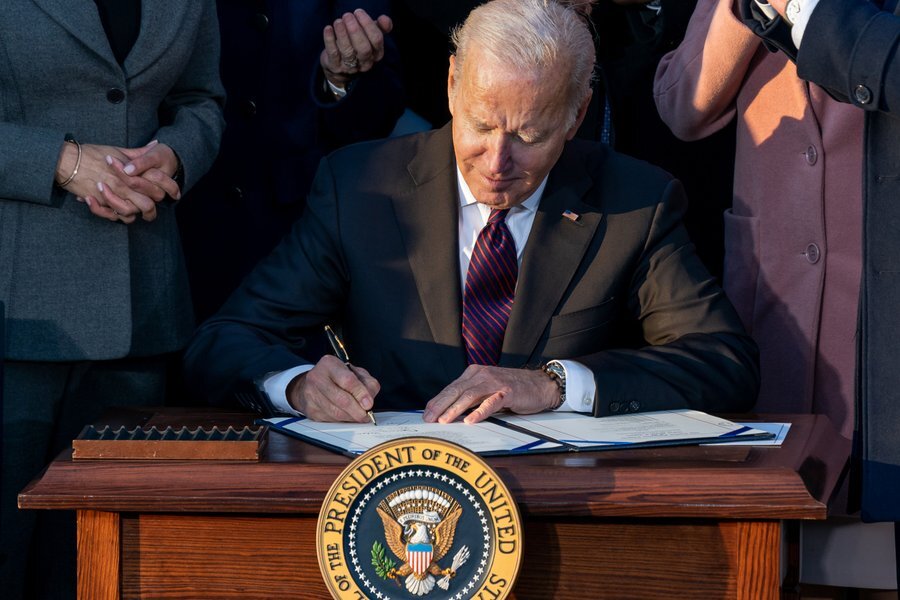 President Biden signs the Infrastructure Investment and Jobs Act on November 15.
